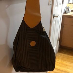 Vintage fendi, fabric getting older so some wear.